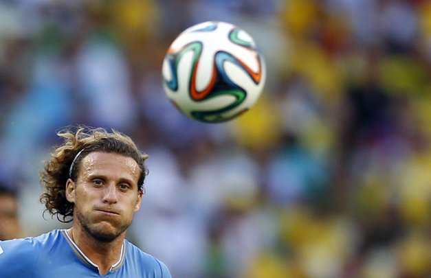 uruguays-diego-forlan-sees-the-ball-in-a-game-against-costa-rica